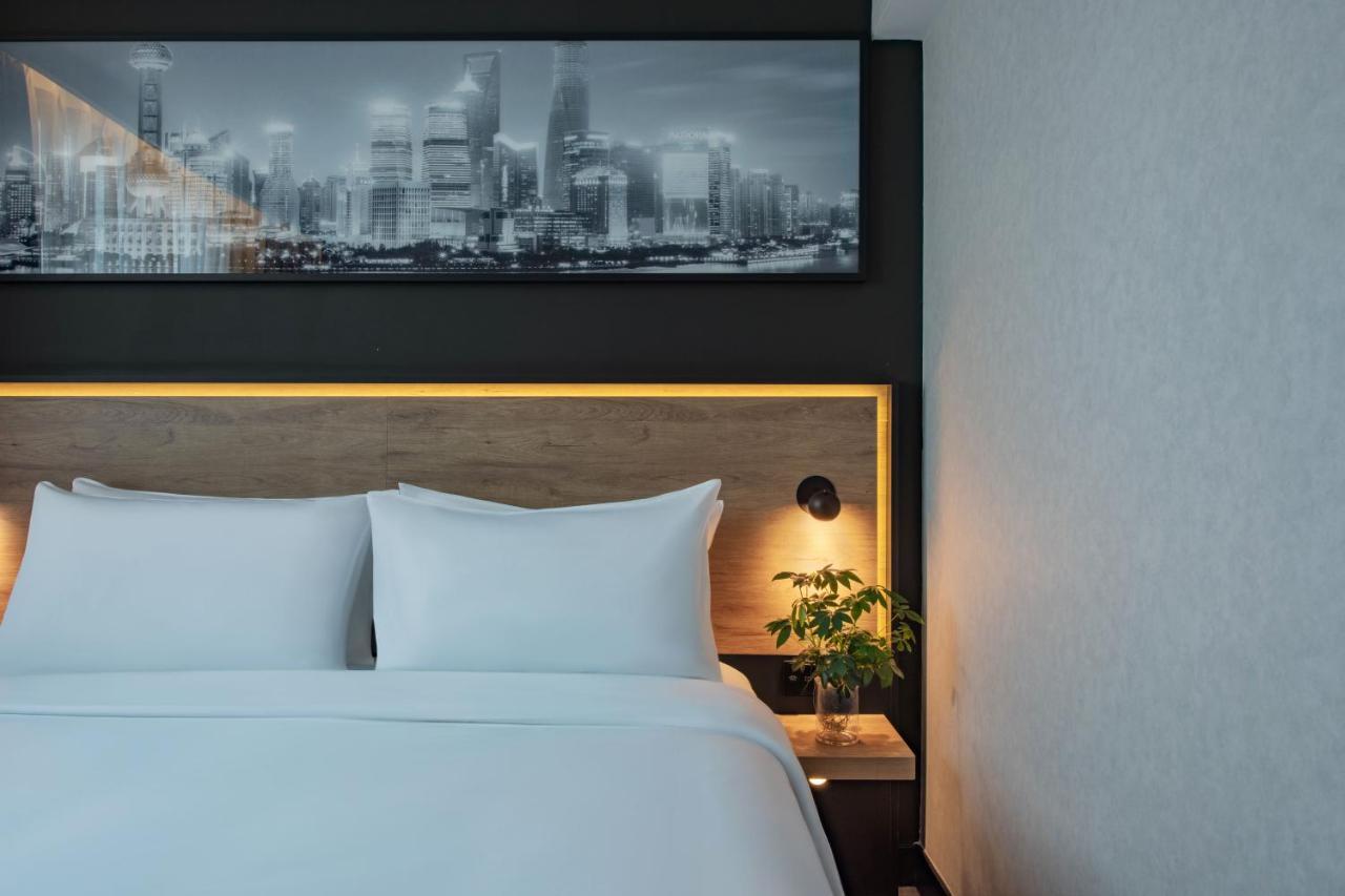 Park Inn By Radisson Shanghai Huanqiugang 外观 照片